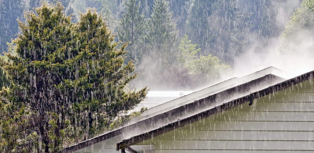 Rain falling on a house in the Rogue Valley
