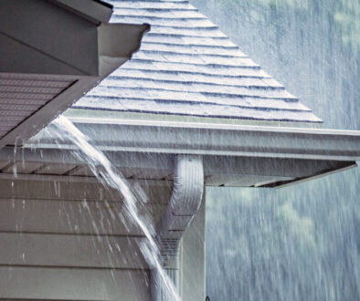 An overflowing gutter on a home in Southern Oregon