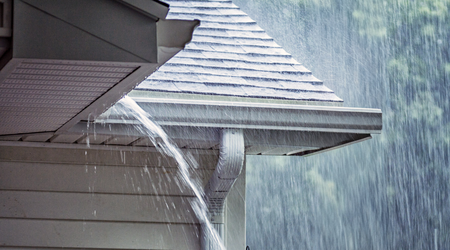 An overflowing gutter on a home in Southern Oregon